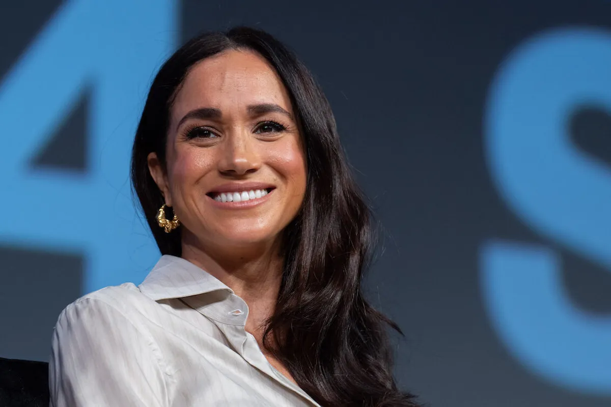 Meghan Markle, who wants a relaxed summer, smiles and looks on
