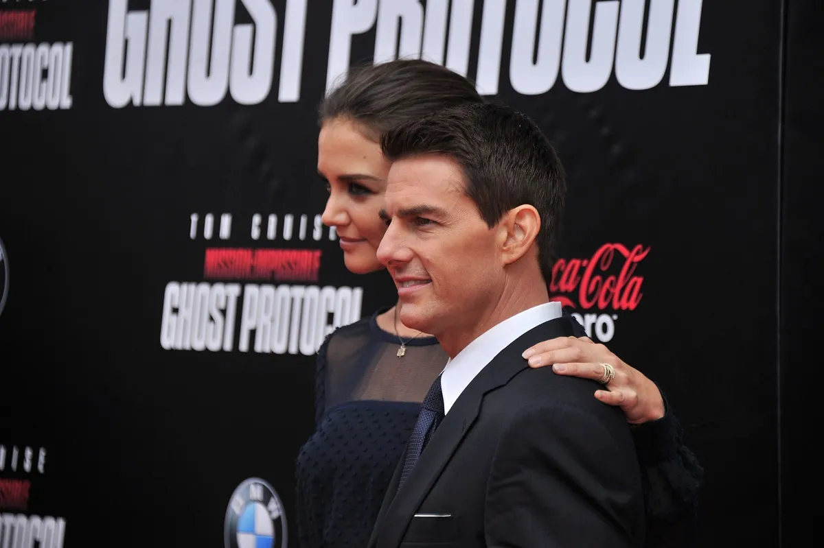 Tom Cruise posing at the premiere of 'Mission Impossible Ghost Protocol' with Katie Holmes.